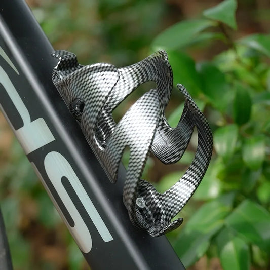 Gabbia per bottiglie di bici in stile carbonio