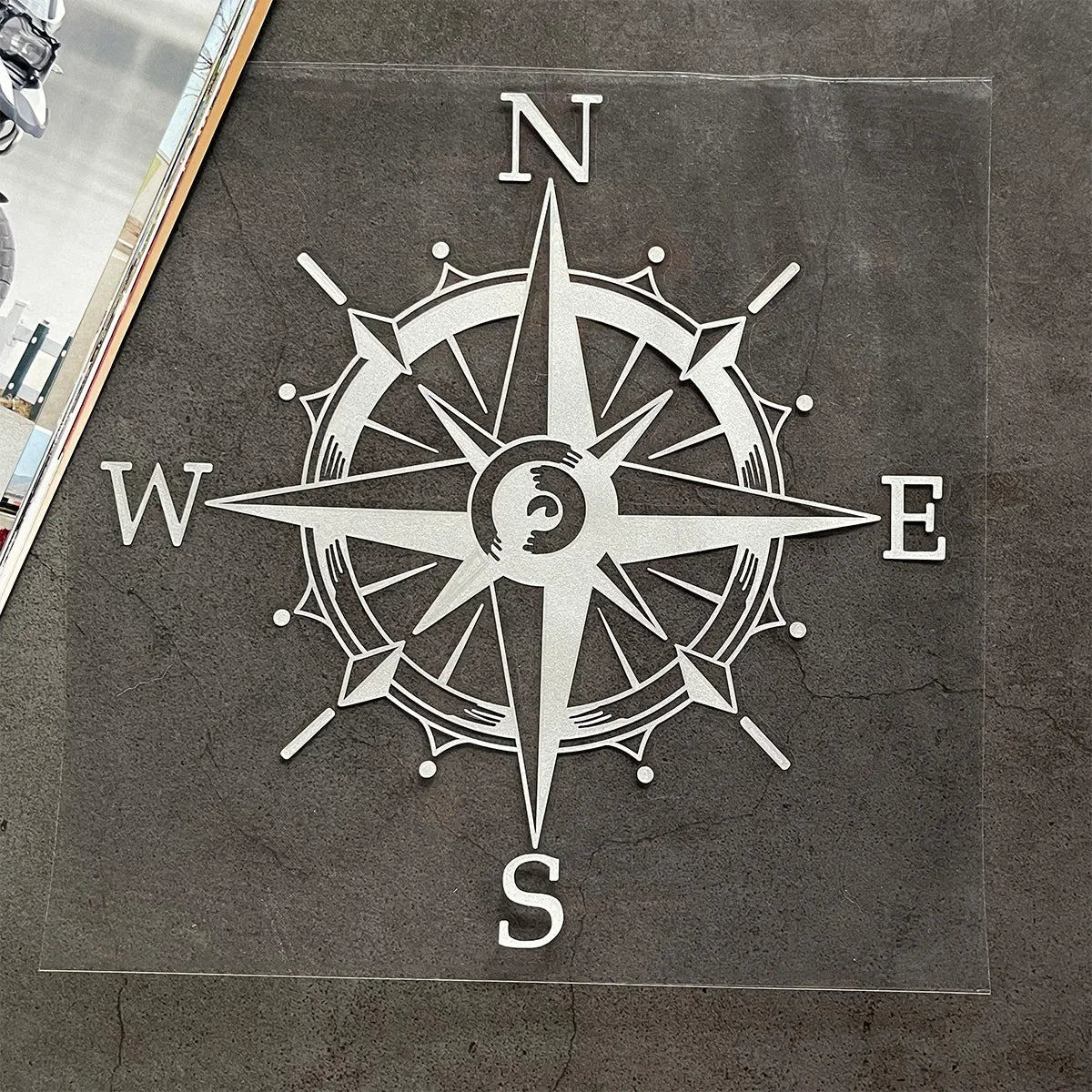 Reflektierende "Kompassrose" -Dahnen