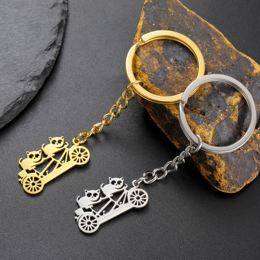 Raccoon on a Bicycle Keychain – Stainless Steel Cycling Gift